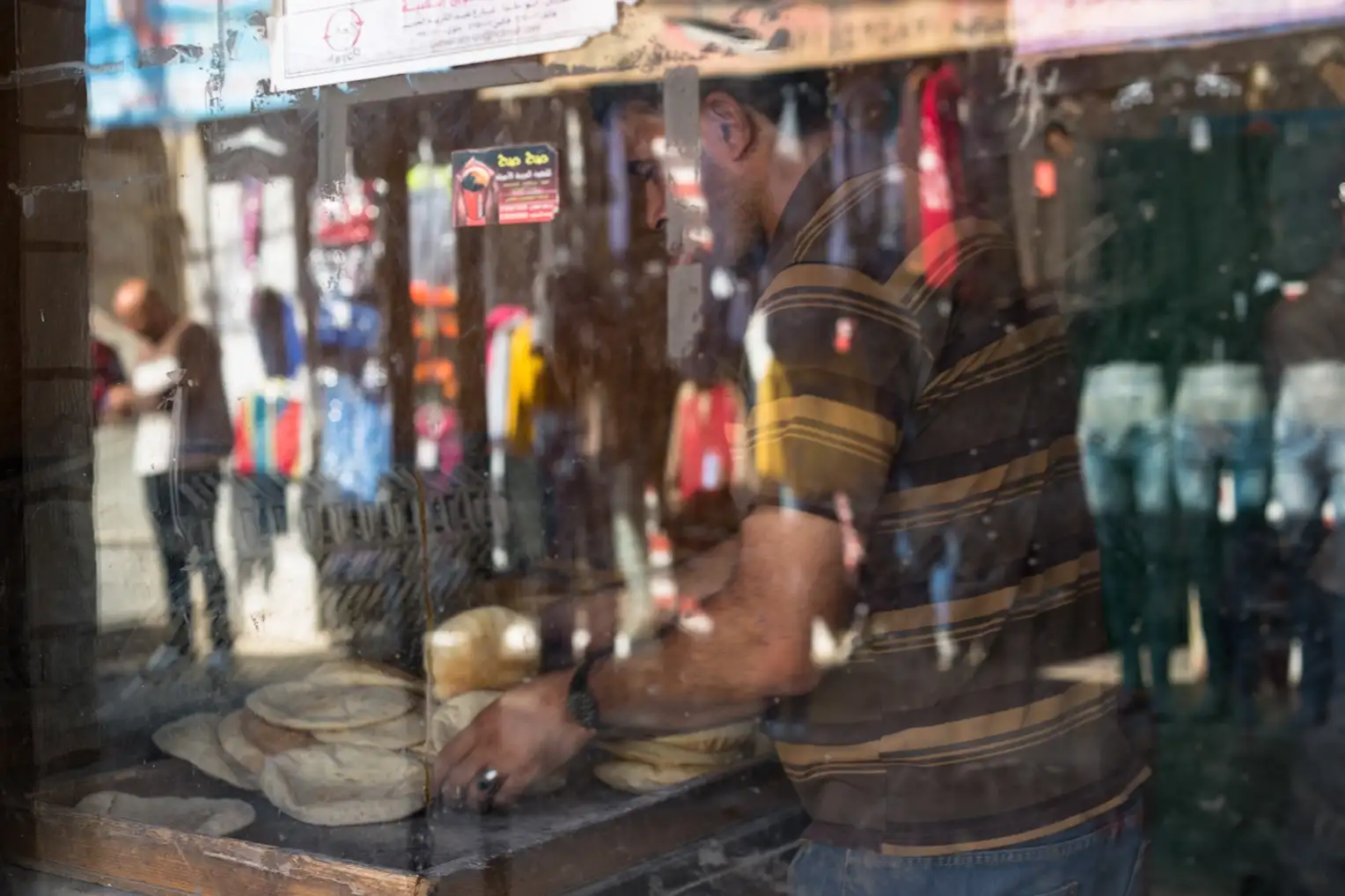 Woman selling a bird at the central market